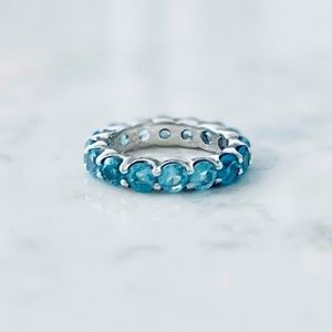 Wms anniversary ring blue topaz sterling silver size 7, excellent pre-owned cond